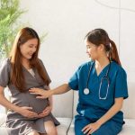 A pregnant woman is having a health screening