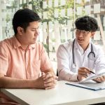 A patient is talking to a doctor.